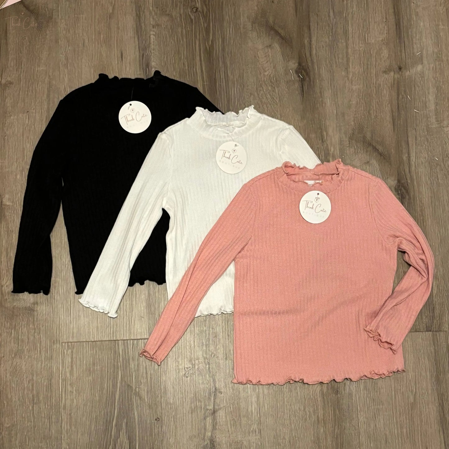 The perfect ribbed & ruffled long sleeve top for girls Think Cute Boutique
